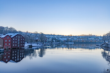 Fototapeta premium Walking along the Nidelven (river) on a cold winter's day in Trondheim city, Trøndelag, Norway