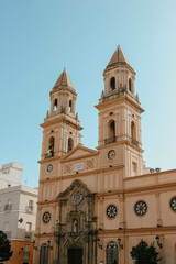 Front side view of catholic church with two symmetric towers 