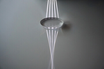 Parallel light passes through a convex lens and is refracted into the focus. Optics physics.