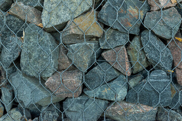 gabion fence wall from steel mesh with stones