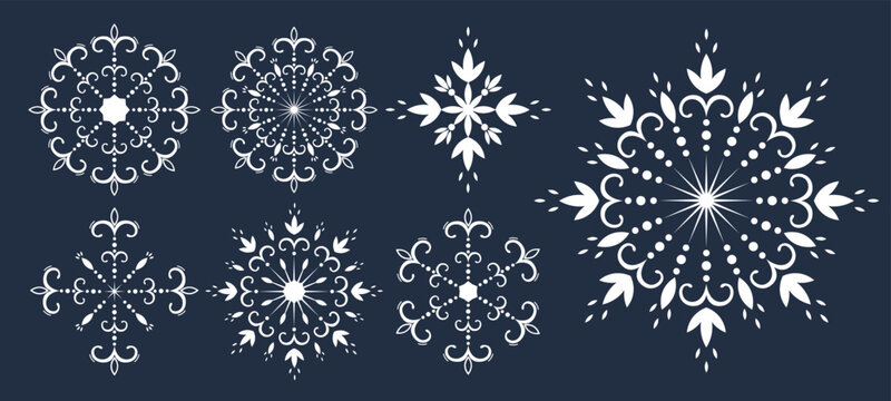 Christmas hand drawn set of snowflakes. Decorative openwork snowflake with curls. Winter design collection. Happy New Year vector illustration isolated on a blue background