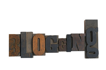 Isolated antique wood block type in reverse spelling blogging
