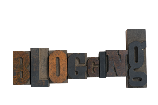 Isolated antique wood block type in reverse spelling blogging