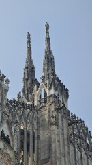 Milan Italy- October 17, 2022: Milan cathedral Duomo di Milano with gothic spires and white marble...
