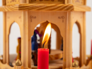 Christmas pyramid. Christmas carols, singers in the form of wooden figures.