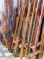 Easels at the art studio covered with paint