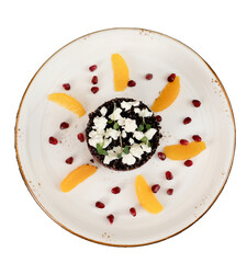 English dessert dish with mango on it