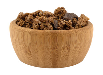 Side view of a wood bowl filled with chocolate chunk granola isolated on a white background.
