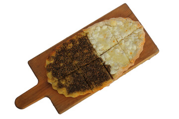 cheese and thyme bread on top of pizza wooden plate
