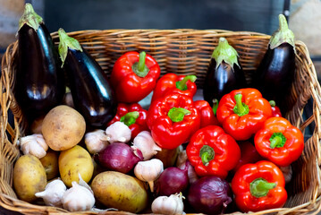 Wicker basket with vegetables. Autumn. Harvest.