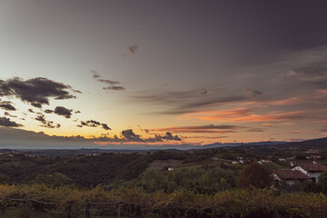 Colorful sunset in the vineyards at the border between Italy and Slovenia