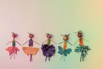 creative figures craft ideas from flowers and  colorful autumnal leaves isolated