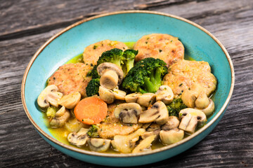 Eid Mubarak Traditional Ramadan Iftar dinner. Assorted tasty food in authentic rustic dishes on wooden blue background. Turkish Bosnian food meat kebab, pita, Sarma, klepe, sogan dolma.