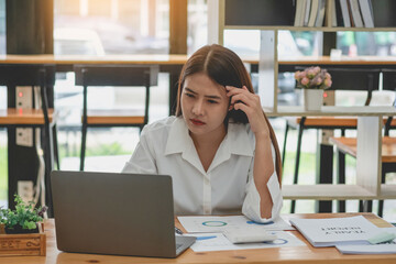 Concept Burnout Syndrome. Business Woman feels uncomfortable working. Which is caused by stress, accumulated from unsuccessful work And less resting body. Consult a specialist psychiatrist.