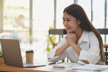 Marketing, Financial, Accounting, Planning, Businesswoman expressing joy that the company has profited from her team work.