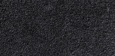 Black asphalt road texture background. Gray-grained road