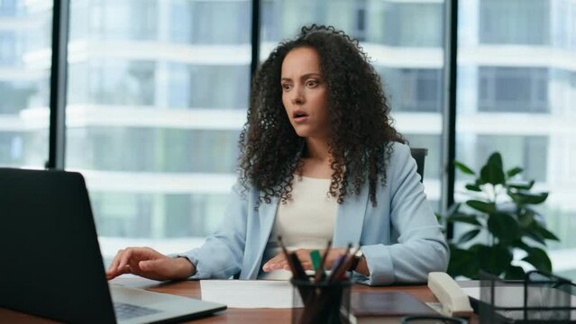 Woman shocked business failure reading bad news on laptop closeup. Girl anxious 