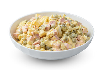 The festive traditional olivier salad is isolated on a white background. Side view, close-up.