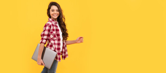 A next-level school. Happy girl child carry laptop. E-learning course. Online course. School girl portrait with laptop, horizontal poster. Banner header with copy space.