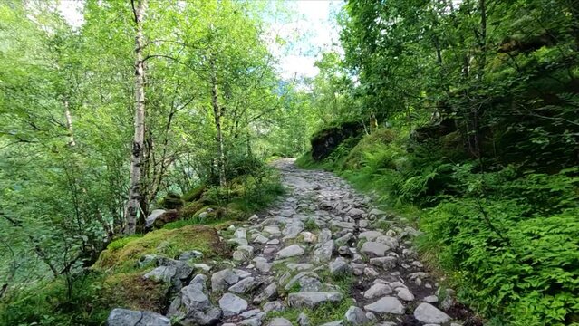 Hiking up a rocky path in Norway, Bondhus, beautiful landscape
