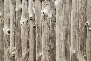 Old weathered aged wooden board yard fence closeup as grunge wooden background
