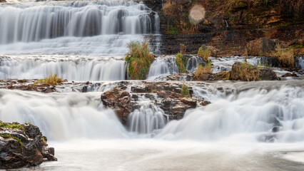 Waterfall at Willow River State Park in Hudson Wisconsin in fall
