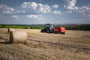Fototapeta na wymiar Summer. Harvesting in a wheat field