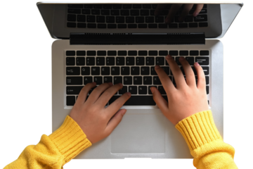 Woman in yellow long sleeve shirt using laptop computer