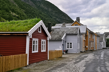 Fototapeta na wymiar Laerdalsoyri, Norway - Street with old wooden houses. A UNESCO historical monument in Norway.