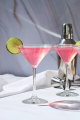 Refreshing Cold Pink Cosmopolitan Cocktail with Vodka and Cranberry