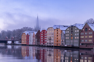 Fototapeta premium Walking along the Nidelven (river) on a cold winter's day in Trondheim city, Trøndelag, Norway