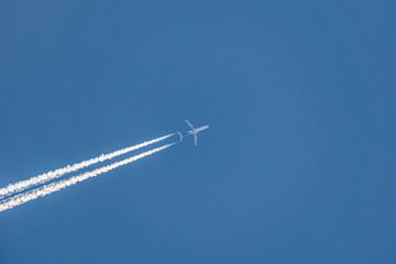 airplane in the blue sky