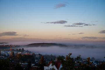 valley of fog with hill