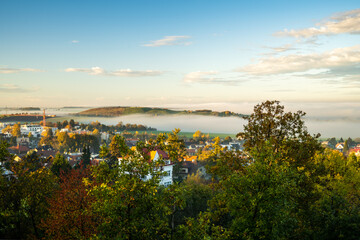 village with incoming fog