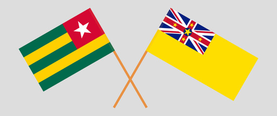 Crossed flags of Togo and Niue. Official colors. Correct proportion