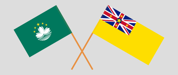 Crossed flags of Macau and Niue. Official colors. Correct proportion