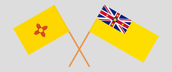Crossed flags of the State of New Mexico and Niue. Official colors. Correct proportion