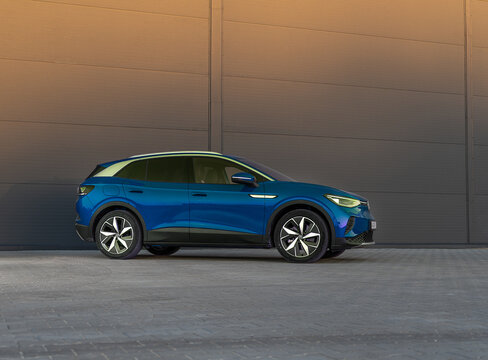 Kyiv, Ukraine - October 7, 2022: New blue electric Volkswagen ID4 side view