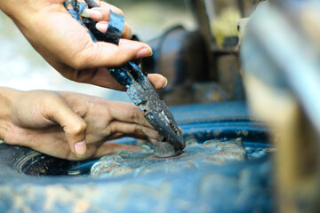 close up of a hand holding a drill