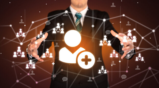 Hand holding social media icons