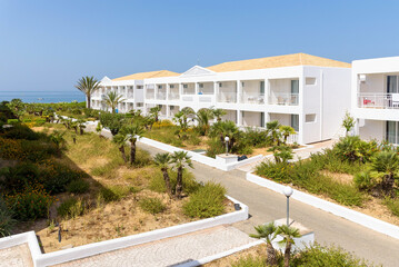 Fototapeta na wymiar Picturesque building of the tourist resort on Corfu island