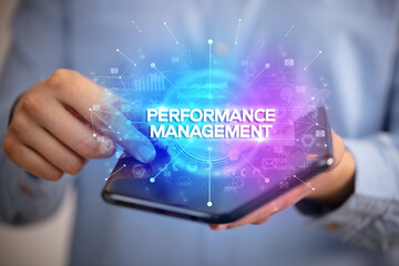 Businessman holding a foldable smartphone, new business concept