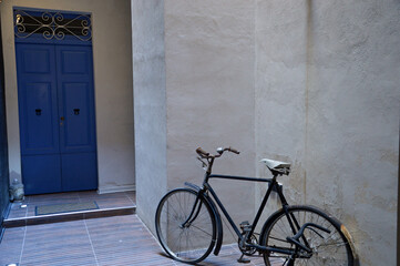 rustic door entrance and bicycle - 540351156