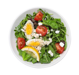 Delicious salad with boiled egg, tomatoes and cheese in bowl isolated on white, top view