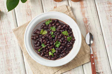 Black bean soup or stew. Latin American or Mexican cuisine.