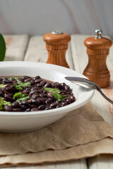 Homemade bean soup on a rustic table.