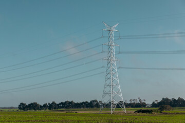 A large steel transmission tower in regional Australia