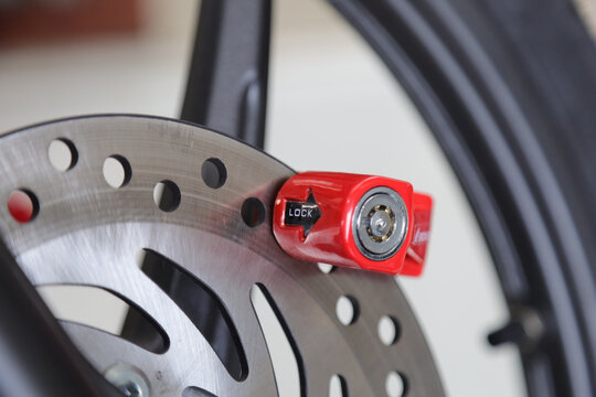 safety locks for motorcycles mounted on motorcycle brake discs.  anti theft lock on motorcycle