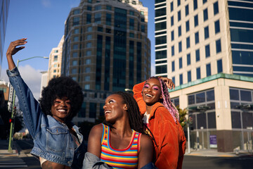 Portrait of young friend group together smiling in the city 
