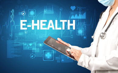 young doctor writing down notes